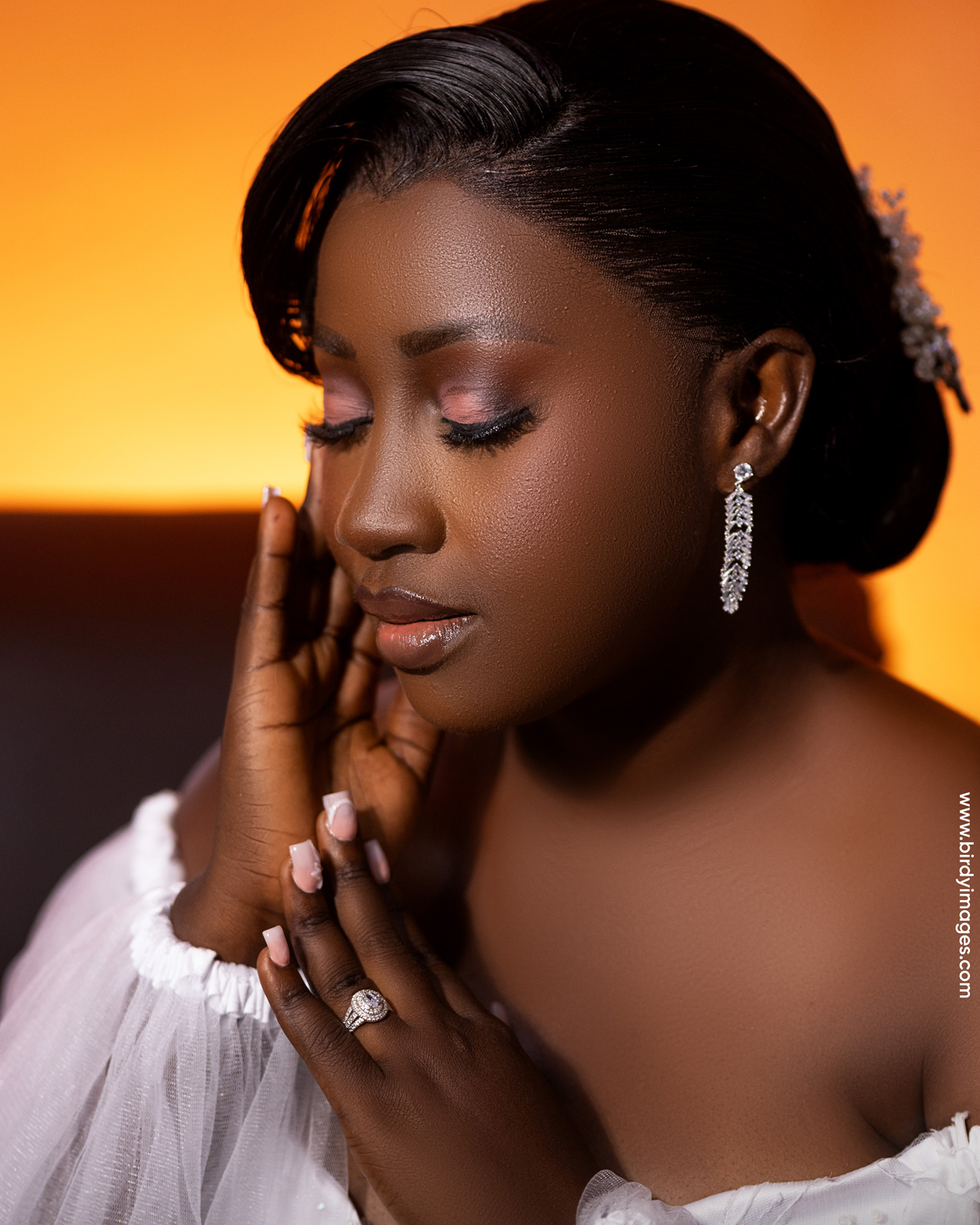 birdie6 A striking high-quality studio portrait of a woman in a sparkling, curve-hugging red dress. The photo showcases creative studio lighting and posing techniques, ideal for birthday shoots, personal branding, or maternity glamour. Birdy Images offers professional studio photography services in Accra, Ghana, creating beautiful, emotional, and timeless images.